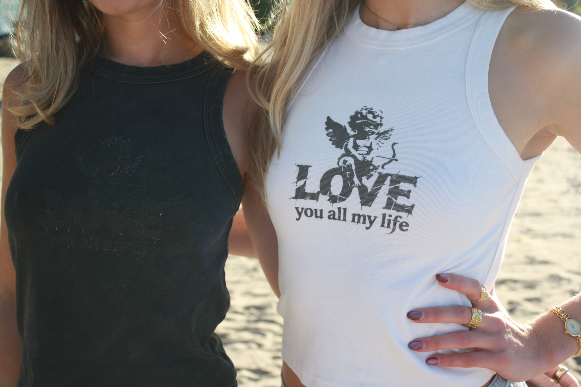 Models wearing the DMK Studios Comfy Tank in black and white